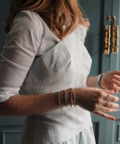 Nina Blanc Tops The Tribute Top